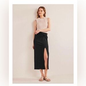 Boden pencil skirt, midi length, NWT size P12. Black with slit.
